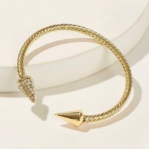 “Gold Spear” from About That Bling